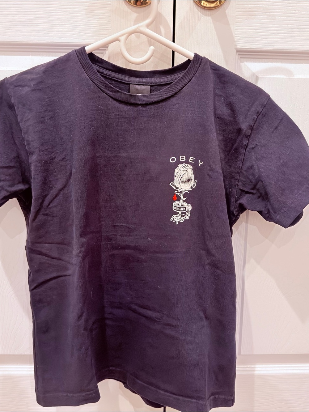 Obey Black Short Sleeve Tee with White Rose Graphic and Red Drop